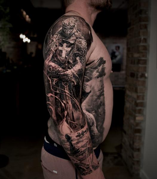 Realism knight tattoo by @carlostorresart
