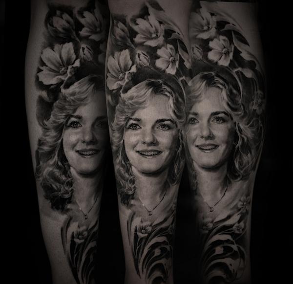 Realism floral portrait tattoo by @carlostorresart
