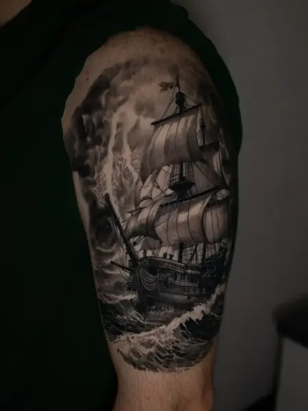 Realism stormy ship tattoo by @inkside1812