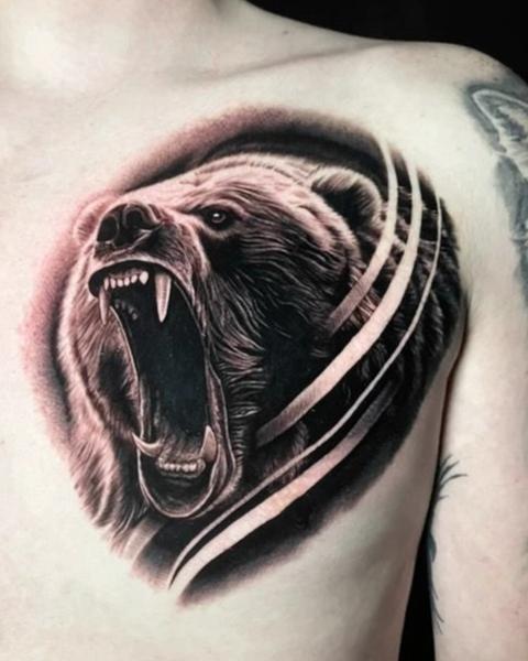 Realism roaring bear tattoo by @skibber_tattoo