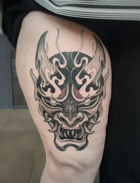 Japanese oni mask tattoo by @skibber_tattoo