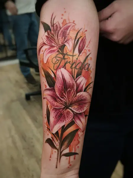 Realism floral lily tattoo by @skibber_tattoo