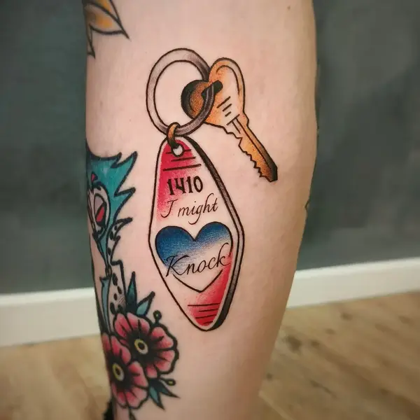 Traditional key and tag tattoo by @skibber_tattoo