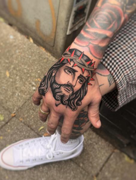 Traditional jesus portrait tattoo by @cedric.weber.tattoo