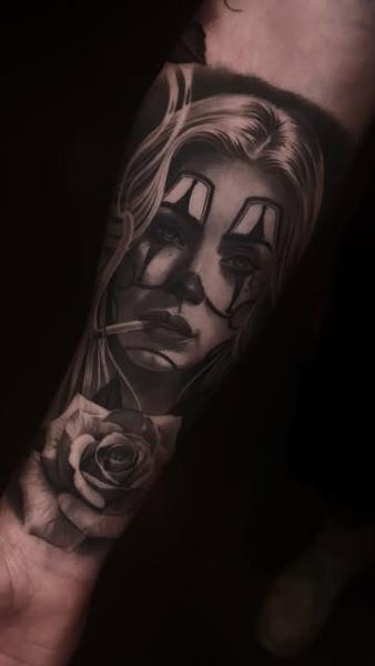 Realism clown woman portrait tattoo by @chanellejasminart