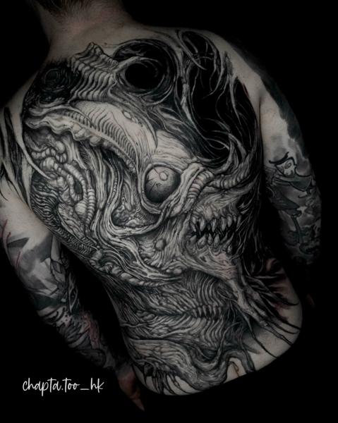 Blackwork abstract creature tattoo by @chapta.too_hk
