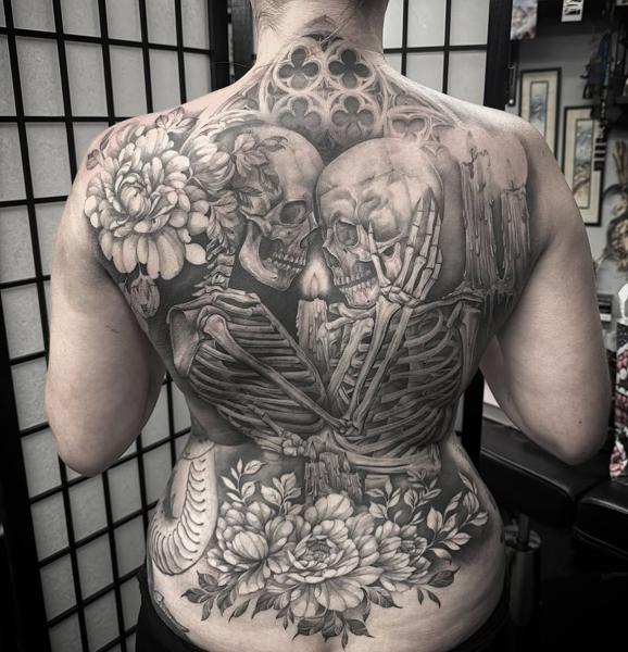Realism skeletons flowers tattoo by @chazappletattoo