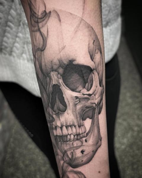 Realism smoking skull tattoo by @chazappletattoo