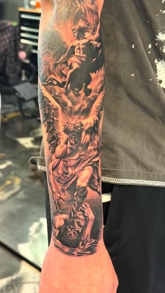 Realism angelic figures tattoo by @charlieinkmanrobbins