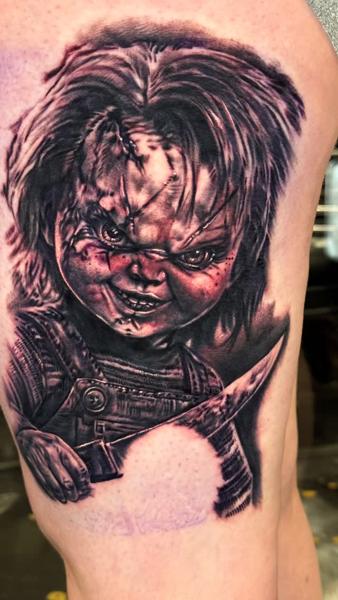 Realism horror doll tattoo by @charlieinkmanrobbins