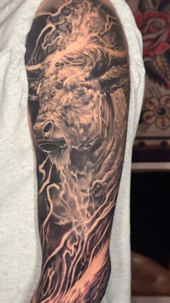 Realism bull tattoo by @charlieinkmanrobbins