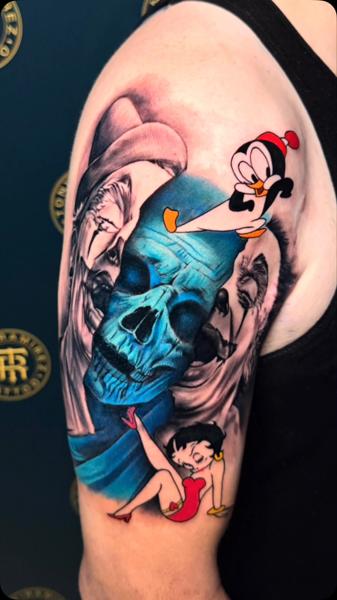 Realism cartoon skull tattoo by @charlieinkmanrobbins