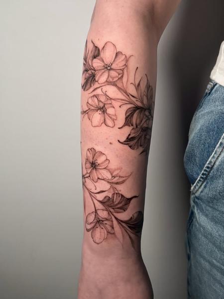 Fine line floral design tattoo by @charliexneedles