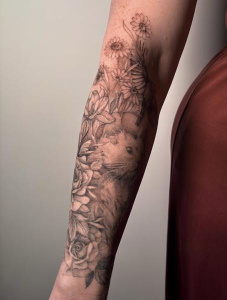 Realism floral animal tattoo by @charliexneedles