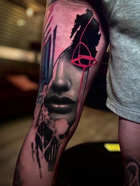 Realism abstract face tattoo by @sirtattooart