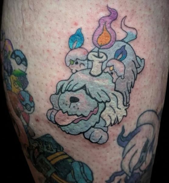 Cartoon candle dog tattoo by @cheyenne_hertz_tattoos