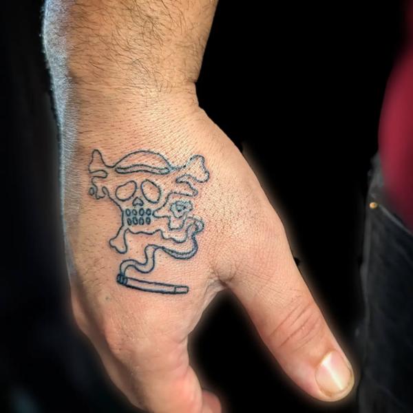 Linework smoking skull tattoo by @cheyenne_hertz_tattoos