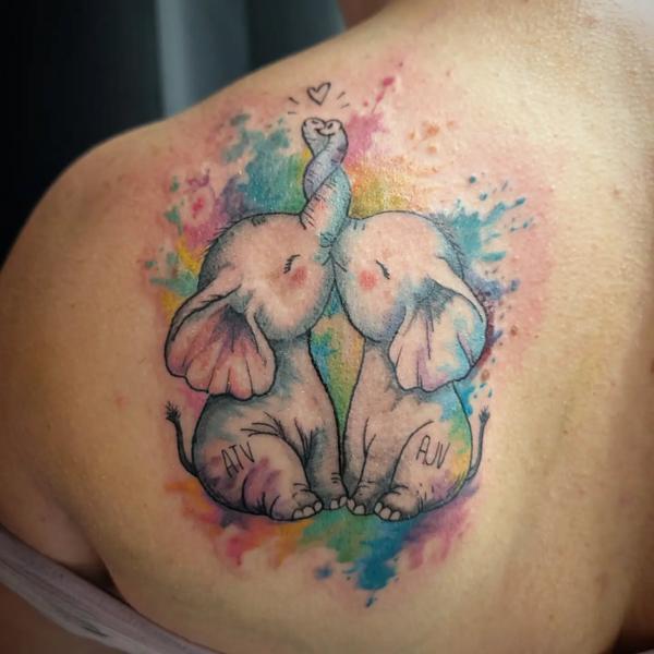 Watercolor elephant couple tattoo by @cheyenne_hertz_tattoos