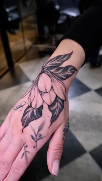 Illustrative blackwork calathea flower tattoo by @itschloepeach