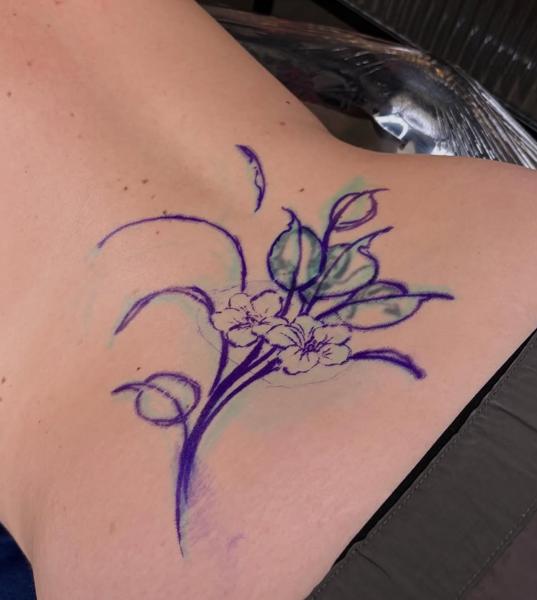 Fine line floral bouquet tattoo by @itschloepeach