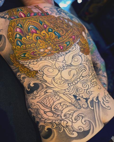 Japanese ornamental mask tattoo by @chriscrookstattoo