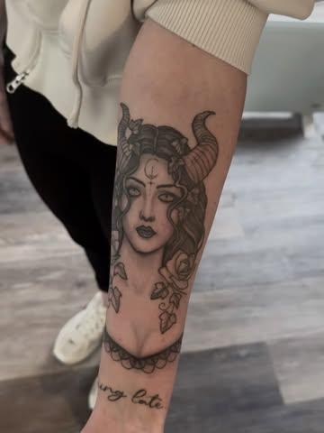 Blackwork horned woman tattoo by @chrishatchtattoo