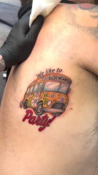 Traditional flower bus tattoo by @chrishatchtattoo