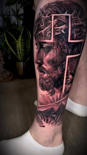 Realism crying jesus tattoo by @chrissimstattoo