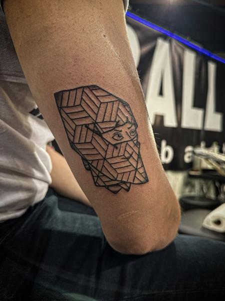 Geometric geometric face tattoo by @radntrad.tattoos