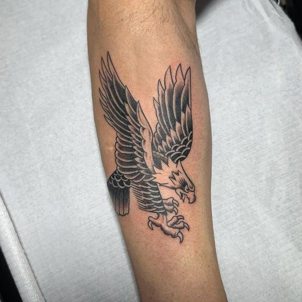 Traditional flying eagle tattoo by @radntrad.tattoos