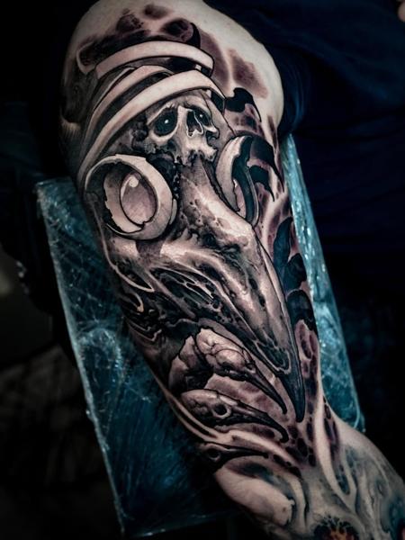 Dark realism horror skull raven tattoo by @boyetattoo