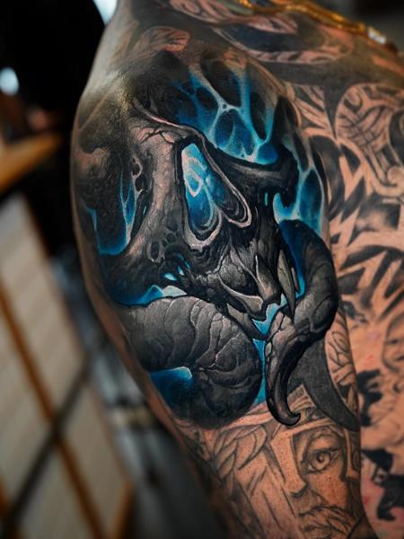 Dark realism demonic skull tattoo by @boyetattoo