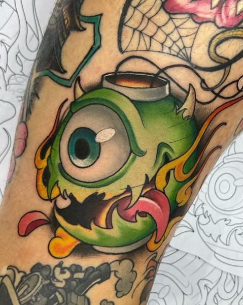 New school flaming monster bomb tattoo by @devilclawtattoo