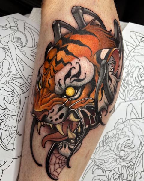 Neo-traditional stylized tiger tattoo by @devilclawtattoo