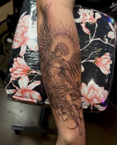 Realism angel tattoo by @jiffaloaf