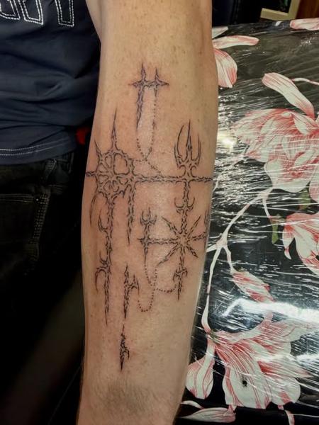Blackwork abstract symbols tattoo by @jiffaloaf