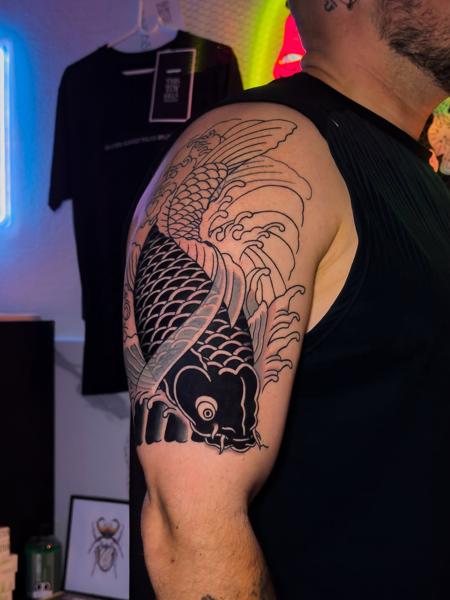 Japanese koi fish tattoo by @moch.tattoo