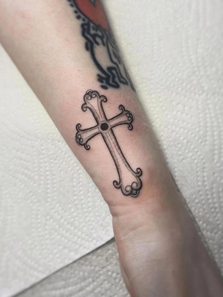 Fine line ornamental cross tattoo by @clairedaisytattoos