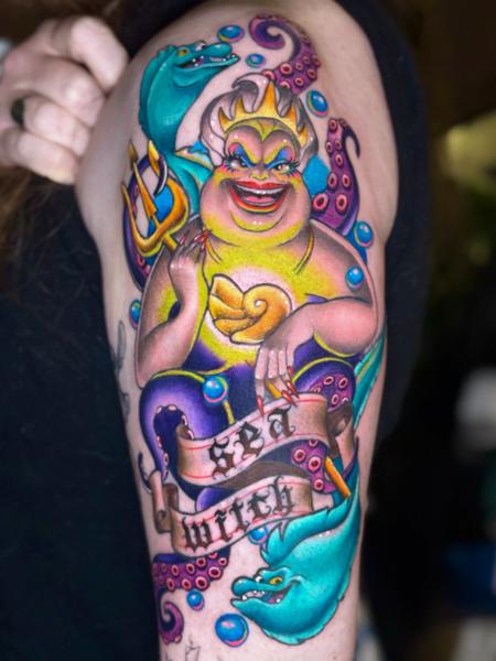 Illustrative ursula character tattoo by @coshtattoos