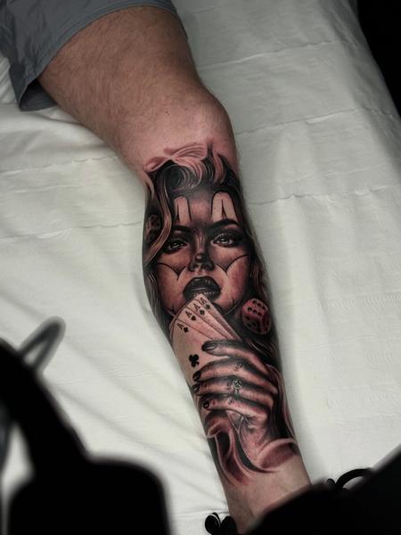 Realism poker face tattoo by @cnoakestattoo