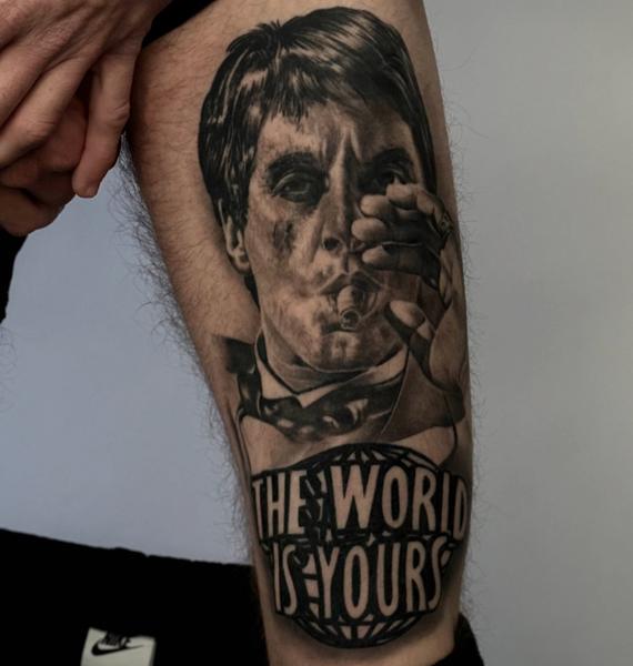 Realism portrait with text tattoo by @cnoakestattoo