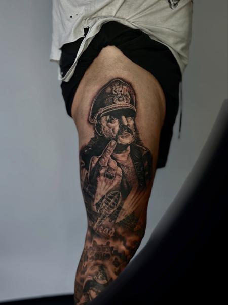 Realism rock musician portrait tattoo by @cnoakestattoo