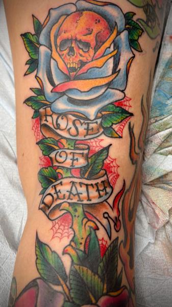 Traditional skull rose tattoo by @colfax_og