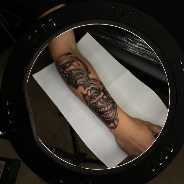 Blackwork comedy tragedy masks tattoo by @soak_latatt23