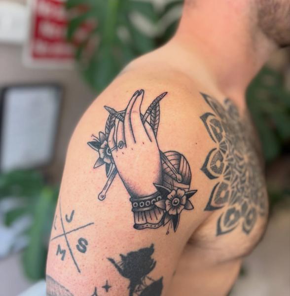 Traditional knitting hand tattoo by @courtz_tattoo