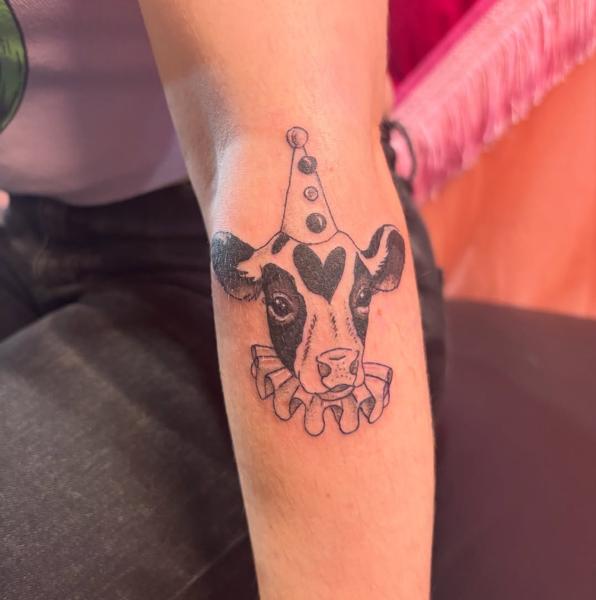 Illustrative clown cow tattoo by @courtz_tattoo