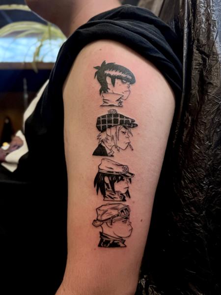 Linework character portraits tattoo by @courtneycokertattoos