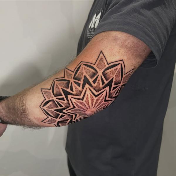 Geometric dotwork geometric mandala tattoo by @craigedentattoo