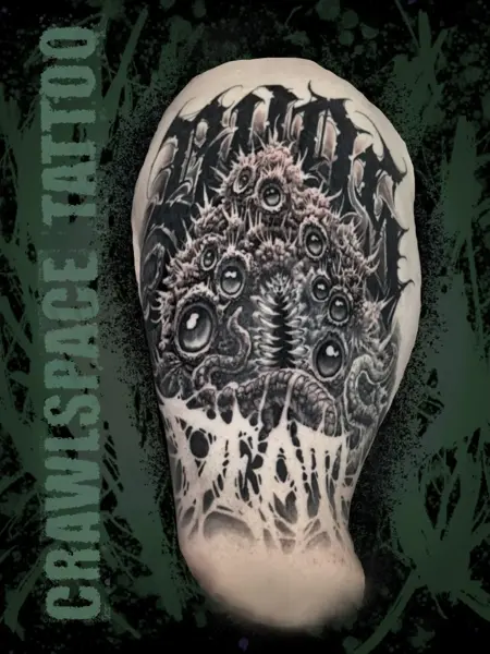 Blackwork eyeball creature tattoo by @crawlspace_tattoo