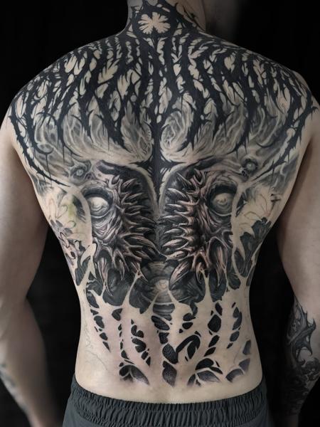 Blackwork abstract forest tattoo by @crawlspace_tattoo